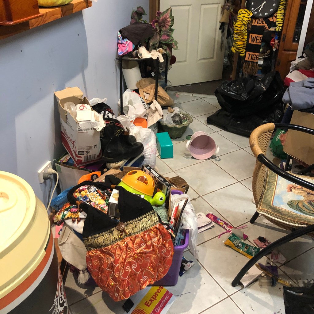 shelves filled with kitchenware, tools, and miscellaneous items.