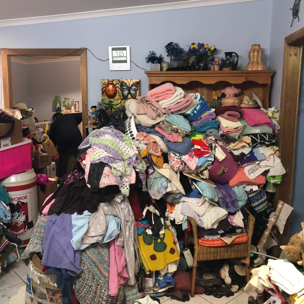 shelves filled with kitchenware, tools, and miscellaneous items.